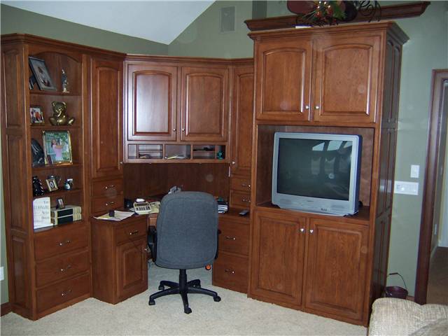 Corner desk/entertainment cabinets in Hickory